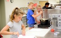 Children enrolled in East Mississippi Community College’s Kids Culinary Camp at the Lion Hills Center are learning to make bread, pastries and a variety of dishes from scratch.