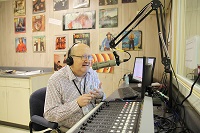 Don Rodney “Radio” Vaughan, a speech, theater and journalism instructor at East Mississippi Community College broadcasts a segment over the college’s radio station, WGTC 92.7 FM in this EMCC file photo. Vaughan is also the manager of the radio station. 