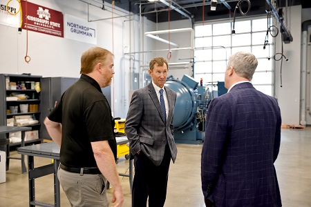 East Mississippi Community College President Dr. Scott Alsobrooks, center, State Treasurer David McCrae, at right, and EMCC Workforce Business Outreach and Training Manager Carlton Ray Hollis during a tour of the Mississippi Advanced Composites Training Center at The Communiversity.