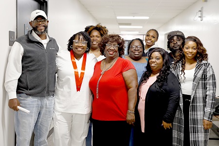 Dennisia Batts, second from left, graduated from East Mississippi Community College’s Associate Degree Nursing program Dec. 5 in a ceremony on the college’s Golden Triangle campus. Her daughter, Kylie Brown, at right, graduated from EMCC the following week in a ceremony on the Scooba campus. They are pictured here with friends and family after Batts’ graduation ceremony.